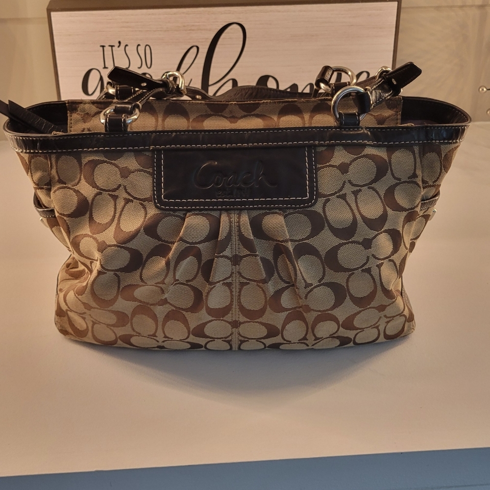 COACH Signature pleated East West Gallery tote.